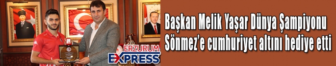 Başkan Yaşar Dünya Şampiyonu Sönmez’e cumhuriyet altını hediye etti