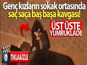 Genç kızların sokak ortasında saç saça baş başa kavgası