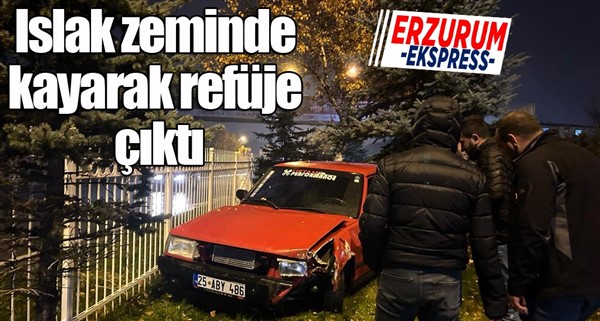 Islak zeminde kayarak refüje çıktı