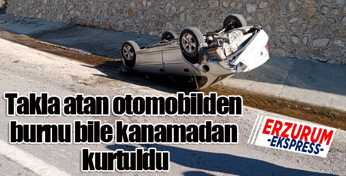 Takla atan otomobilden burnu bile kanamadan kurtuldu